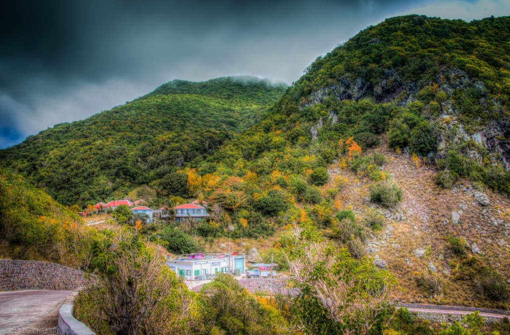 The Road Out Of St John's Bends Around Past Old GEBE